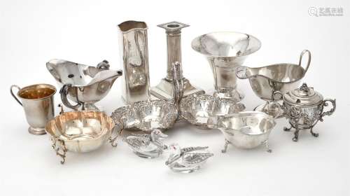 A collection of silver and silver coloured items