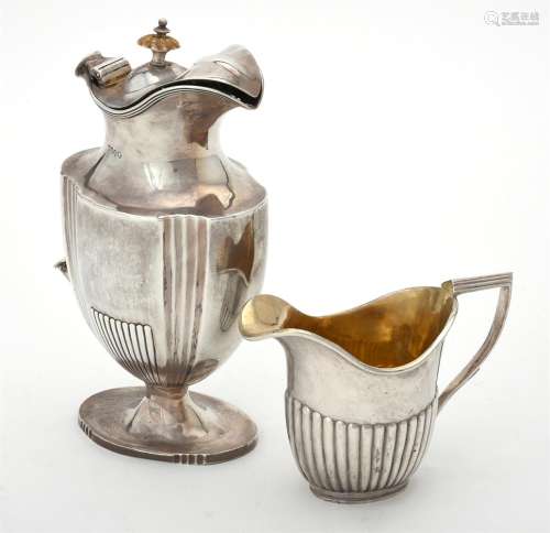 Y A Victorian silver shaped oval and fluted jug by Robert Ha...