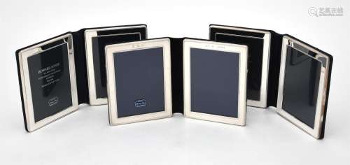 Three silver mounted folding double photo frames by Kitney &...