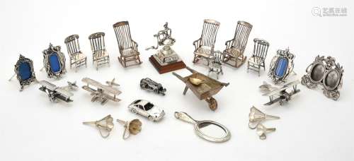 A collection of silver and silver coloured miniature models