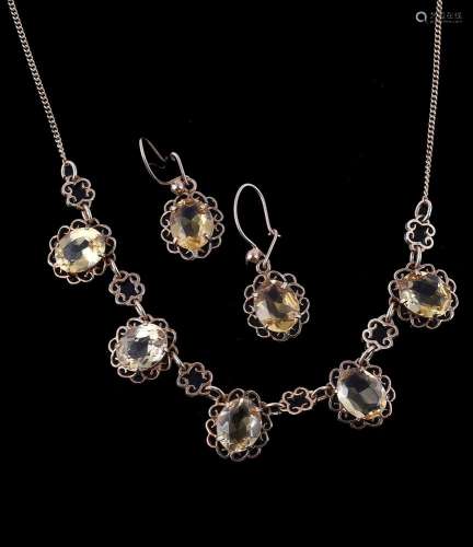A 1970s 9 carat gold citrine necklace and earring suite
