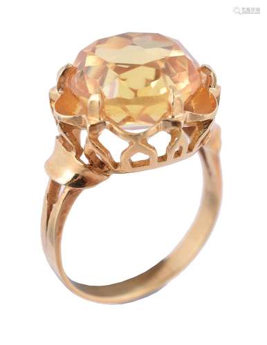 A synthetic yellow sapphire dress ring