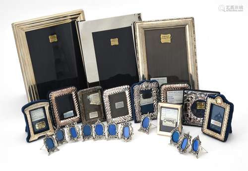 A collection of silver mounted photo frames