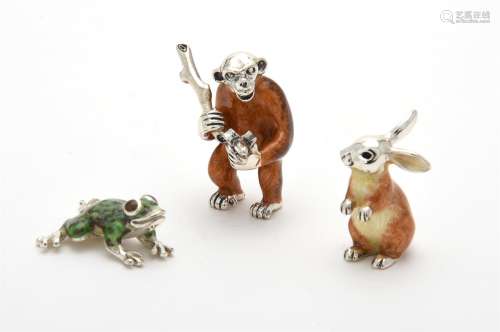 Silver and enamel models of a monkey, frog and a rabbit