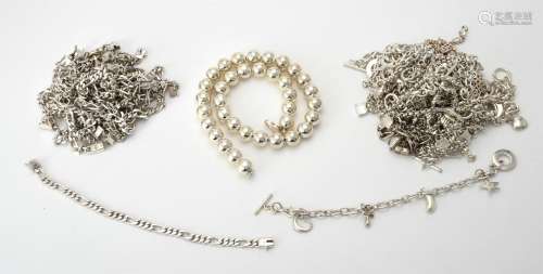 A collection of silver and silver coloured jewellery