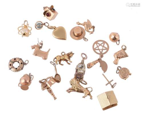 A collection of gold coloured charms
