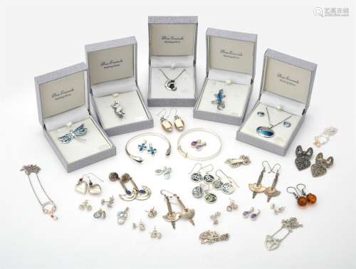 A collection of various silver and silver coloured jewellery