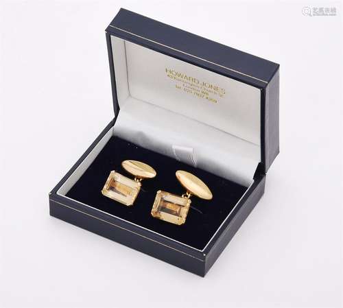 A pair of citrine and gold coloured cufflinks