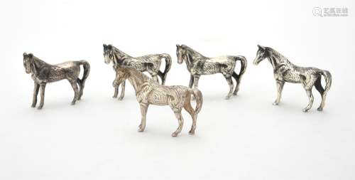 Four silver models of horses