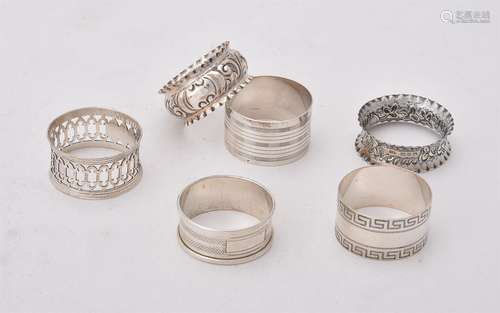 A collection of silver napkin rings