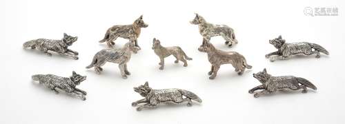 Ten assorted silver models of foxes