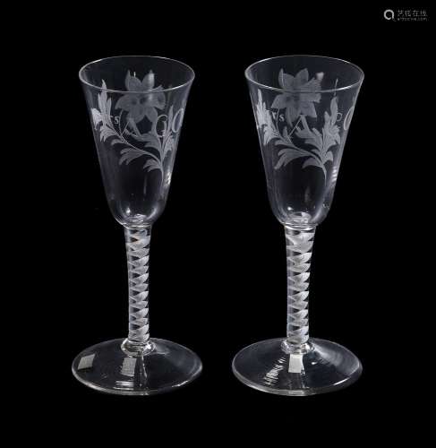A pair of engraved commemorative opaque-twist ale glasses