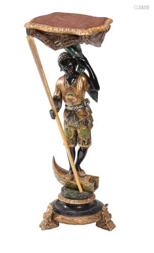 An ebonised, gilt and polychrome painted carved wood Blackam...