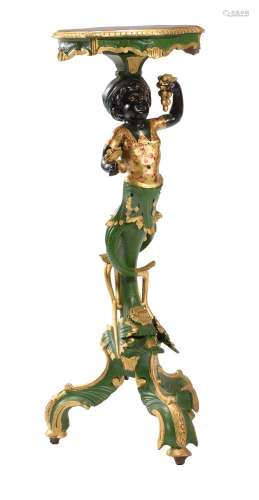 An ebonised, gilt and polychrome painted carved wood Blackam...