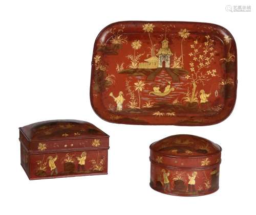 A group of red and gilt painted tinware (toleware) desk item...