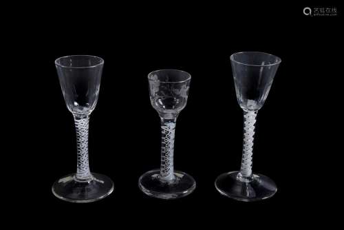 Three various opaque-twist wine glasses