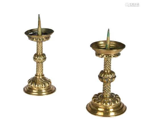 A pair of German or Dutch repousse brass pricket candlestick...