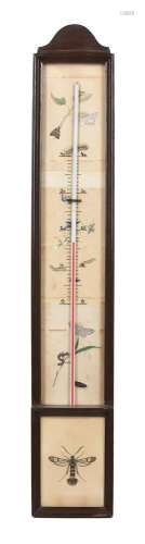 A stained wood cased wall barometer