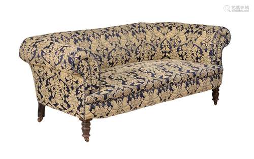 A Victorian walnut and upholstered sofa