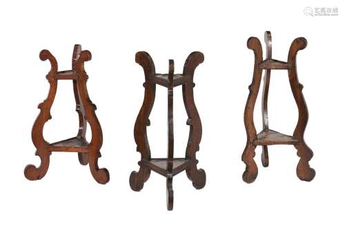 A harlequin group of three beech and walnut triangular two t...