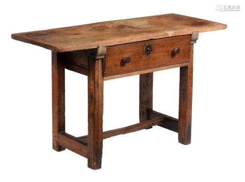A Spanish walnut and oak side table