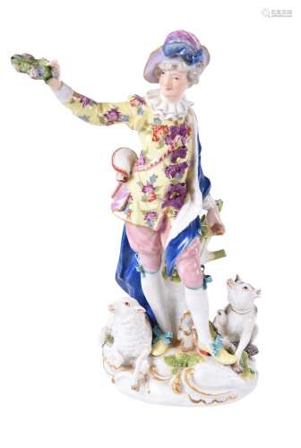 A Meissen model of a shepherd with a sheep-dog and sheep