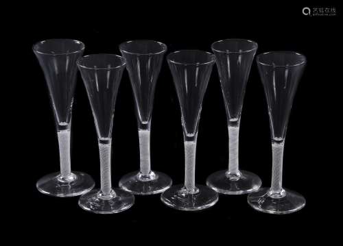 Six similar opaque-twist wine flutes