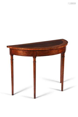 A George III satinwood and mahogany side table