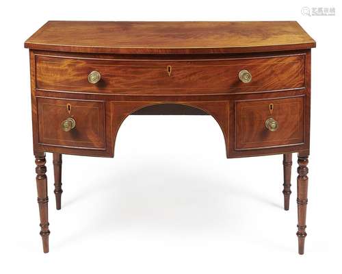 A Regency mahogany and line inlaid bowfront sideboard