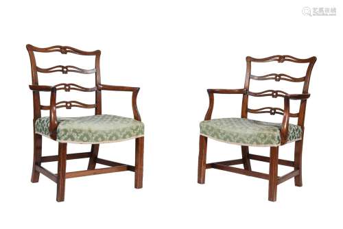 A pair of George III mahogany armchairs