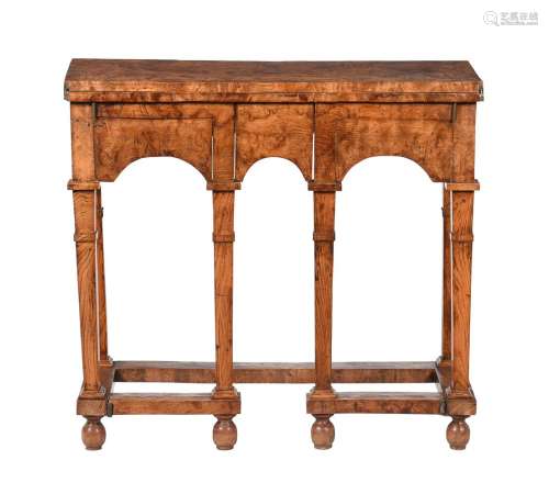 A burr elm writing table in William & Mary style