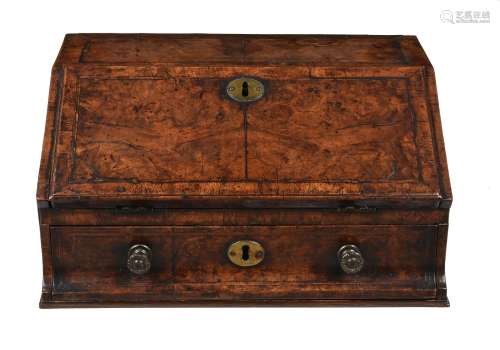 A George I walnut and feather banded travelling writing box
