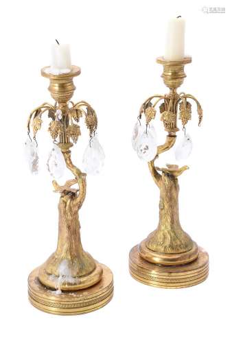 A pair of French or English gilt bronze and moulded glass mo...