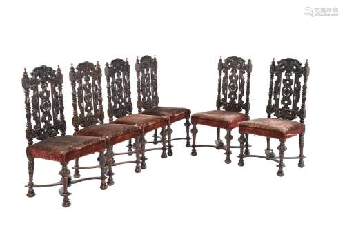 A set of six Victorian stained and carved oak dining chairs ...