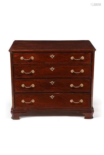 A figured mahogany and inlaid chest of drawers