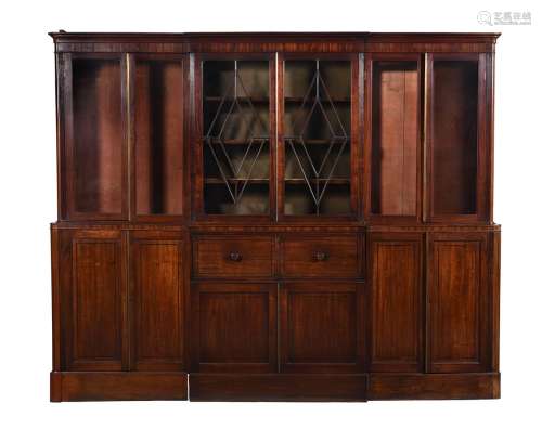 Y A mahogany and ebony inlaid breakfront bookcase
