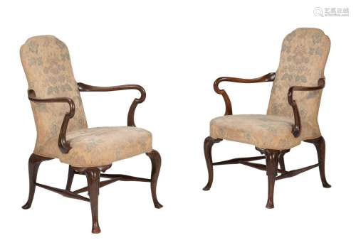 A pair of walnut and beech armchairs in George I style