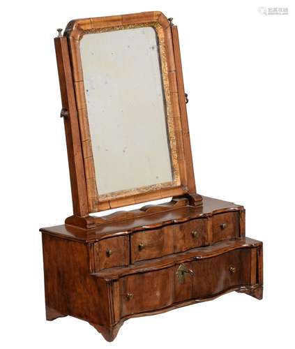 A walnut platform dressing mirror