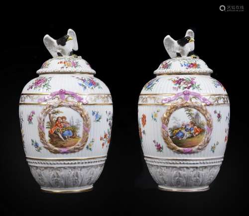 A pair of German porcelain Berlin style vases and covers wit...