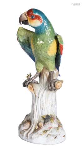 A Meissen model of a parrot perched upon a tree stump