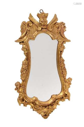 A Continental carved giltwood wall mirror