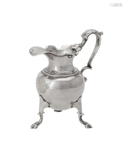 A George II silver cream jug by John Gorsuch