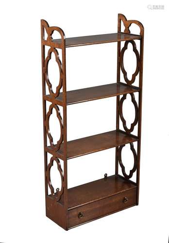 A flight of four mahogany wall shelves in George III style