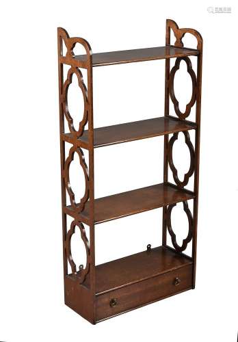 A flight of four mahogany wall shelves in George III style