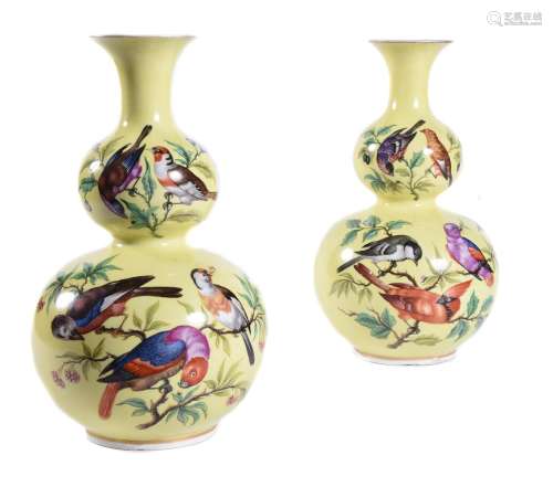 A pair of Dresden yellow ground double gourd vases painted w...