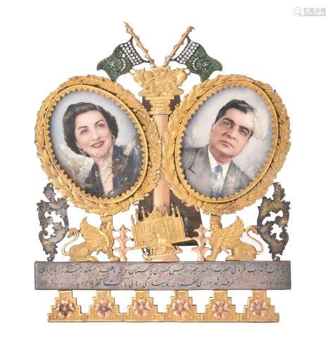 A silver gilt coloured and steel backed photo frame from Teh...