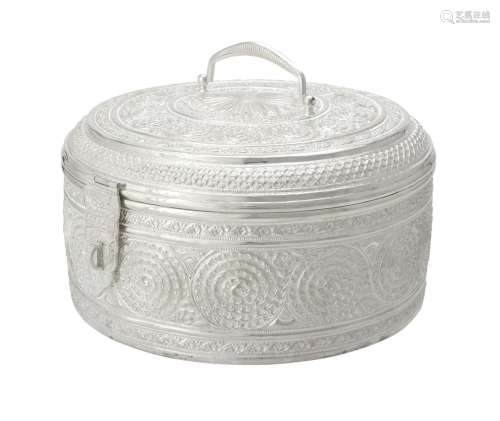 An Omani silver coloured circular box