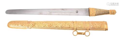 A cased Omani gold coloured mounted scabbard and sword