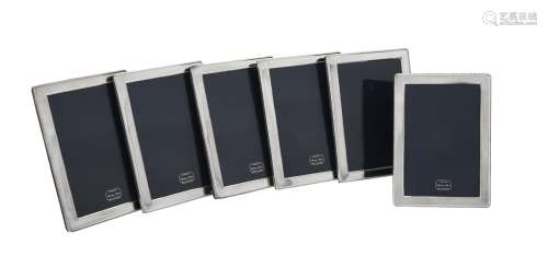 Six silver mounted rectangular photo frames by Kitney & Co.