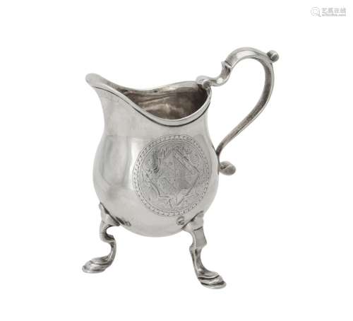 A George I silver pear shaped cream jug by John Eckford II